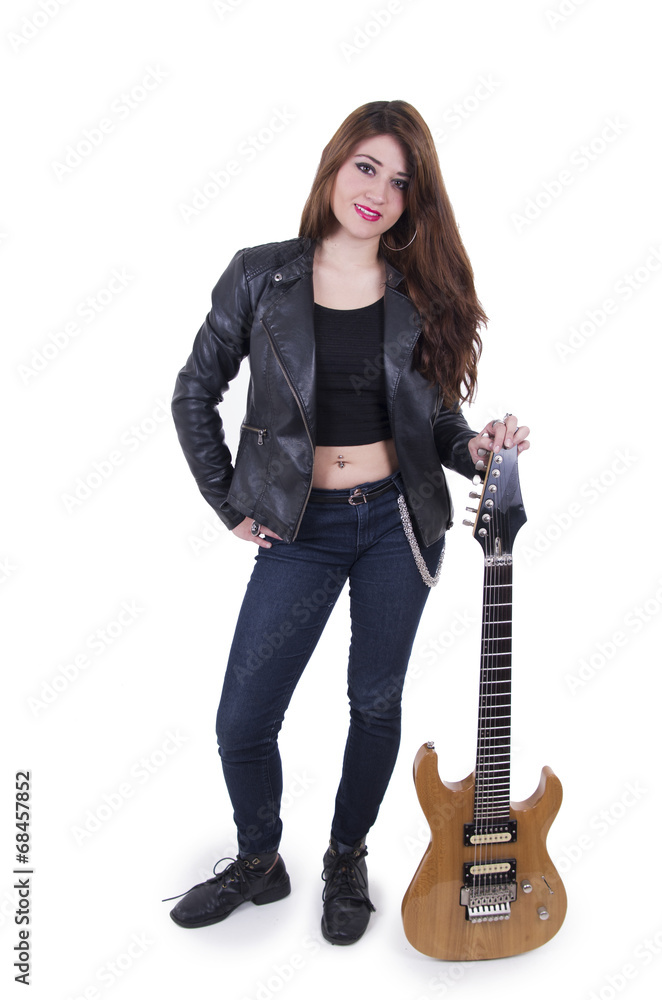 Beautiful rebel young girl posing with electric guitar Beautiful rebel young girl posing with electric guitar