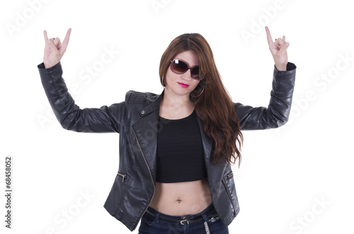 Attractive rocker girl wearing leather jacket and sunglasses