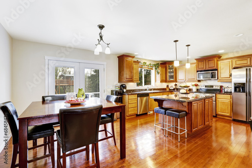 Kitchen room with dining table set