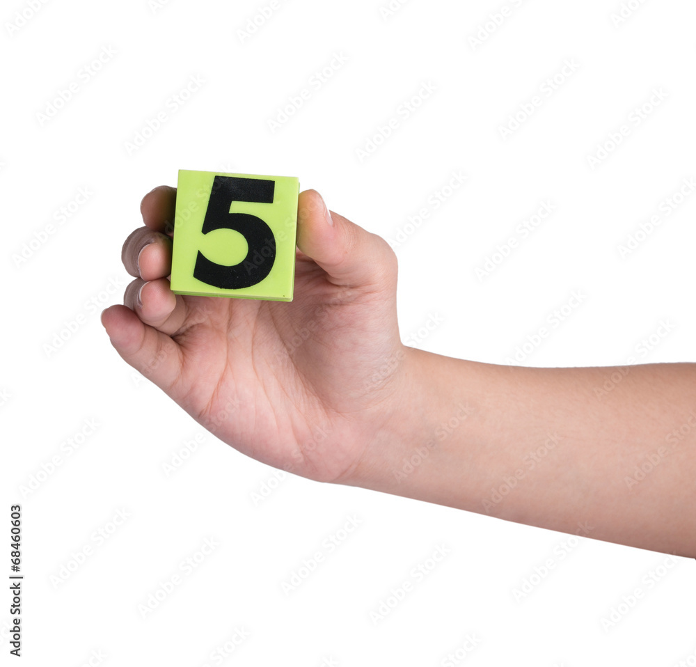 Hand holind colorful plastic numbers on a white background Hand holind colorful plastic numbers on a white background