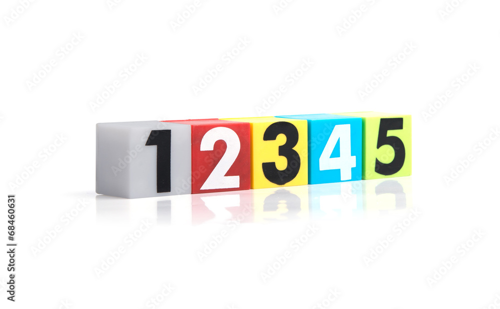Colorful plastic numbers on a white background Colorful plastic numbers on a white background