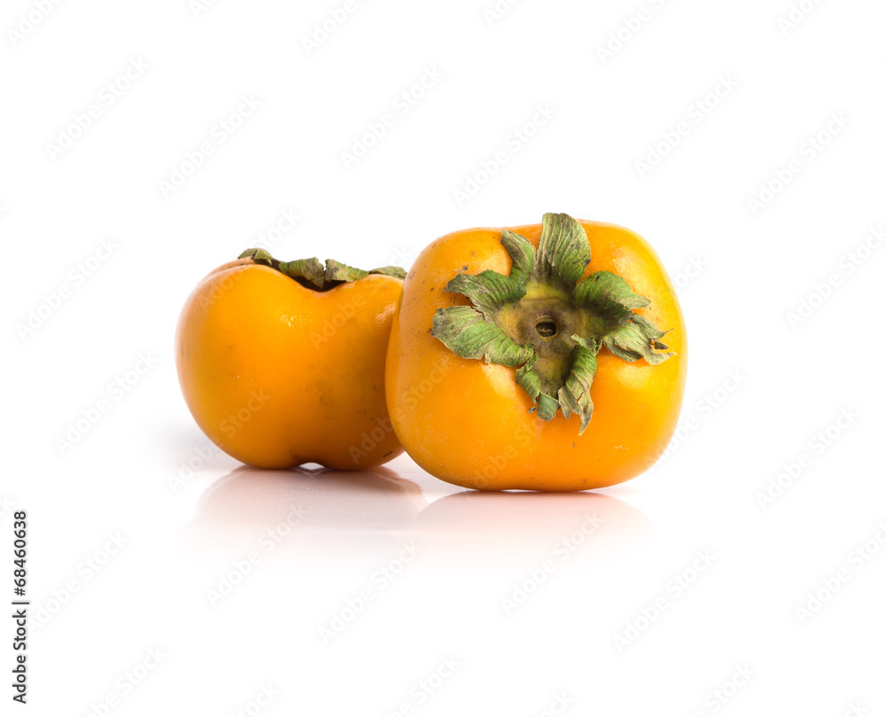 Ripe persimmon isolated on a white background Ripe persimmon isolated on a white background