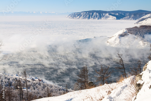 Winter landscape of Lake Baikal. Start of the Angara river photo