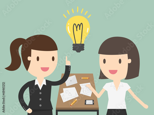 Business woman explaining a financial plan to colleagues at meet