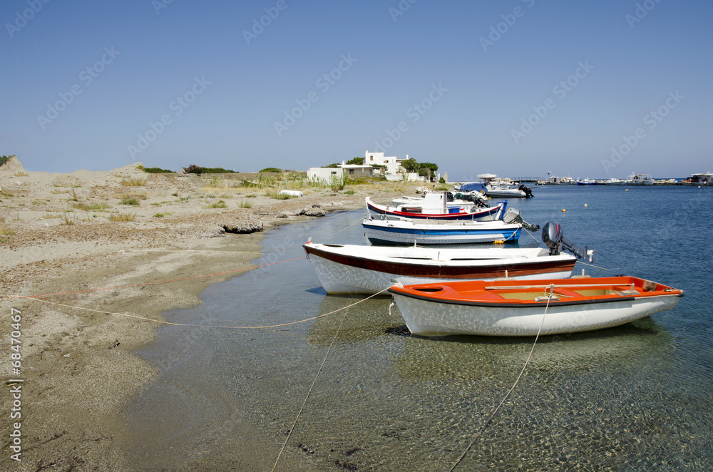 Tranquil scene os small fisherboats at the harbor of Skyros isla