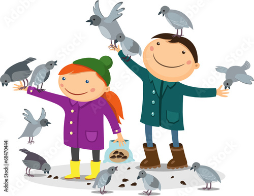 boy and girl feeding birds and urban pigeons