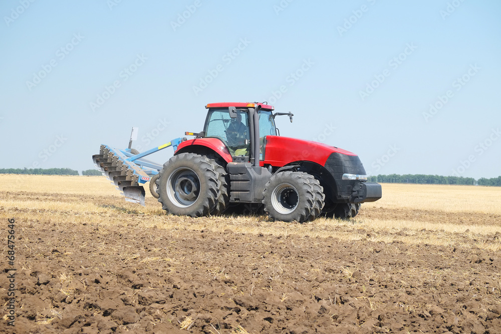 tractor with a plow