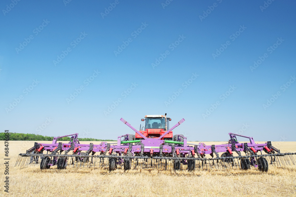 Fototapeta premium tractor with a plow