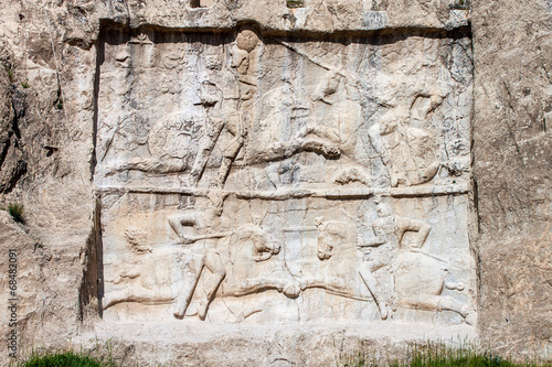 Naqsh-e Rustam, carving of the victory of Bahram II. Iran. photo