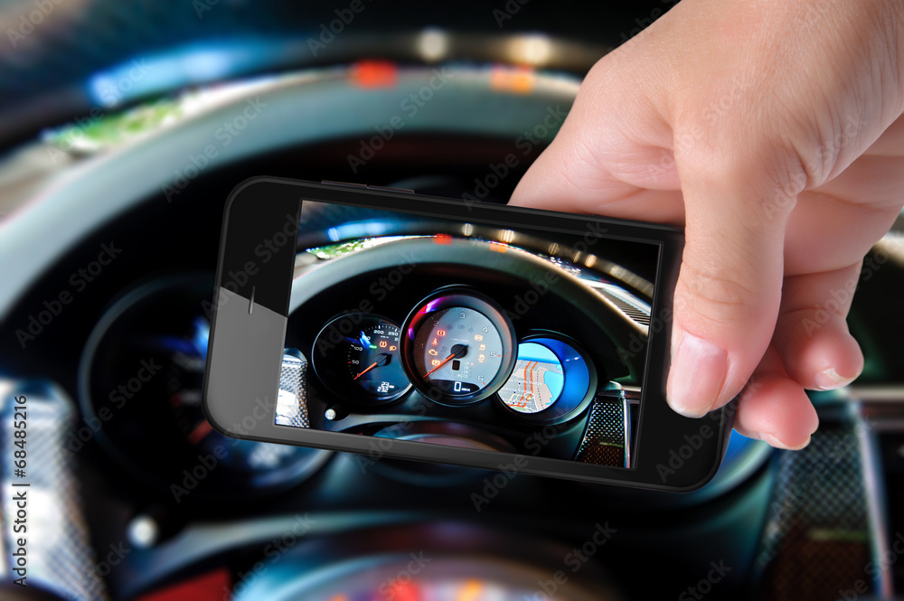 Hands taking photo car interior with smartphone Hands taking photo car interior with smartphone