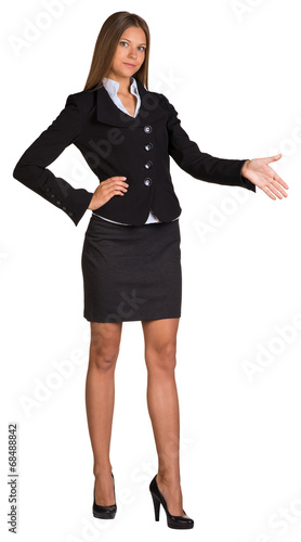 Businesswoman points hand toward