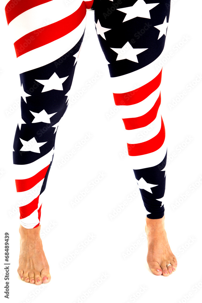 Womens legs in stars and stripes leggings bare feet Womens legs in stars and stripes leggings bare feet