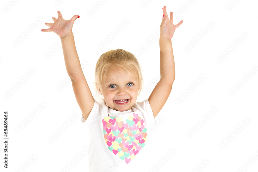 Adorable young girl happy with arms stretched up in the air Adorable young girl happy with arms stretched up in the air