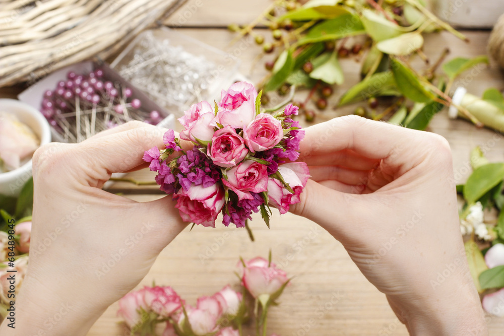 Steps of making wrist corsage. Florist at work. Steps of making wrist corsage. Florist at work.