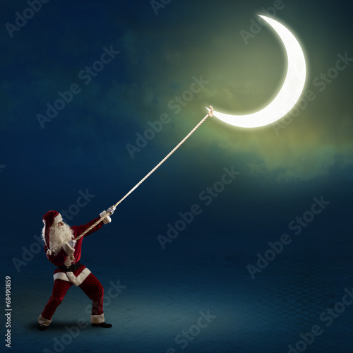 Santa Claus pulls the moon