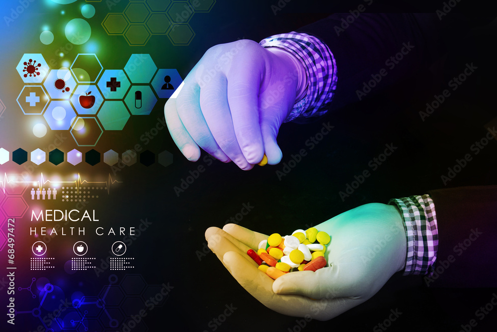 Obraz premium doctor holding in hands pills