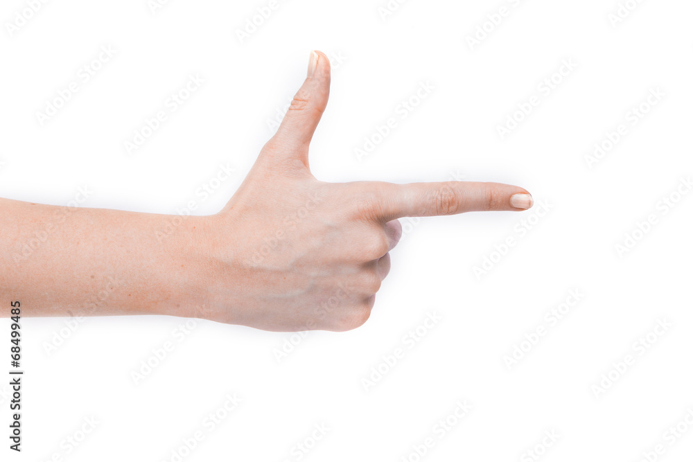 Female hand showing gesture on an isolated white background Female hand showing gesture on an isolated white background