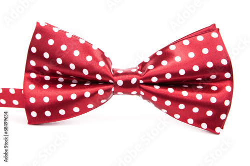 Valokuvatapetti Elegant red bow tie with white polka dots
