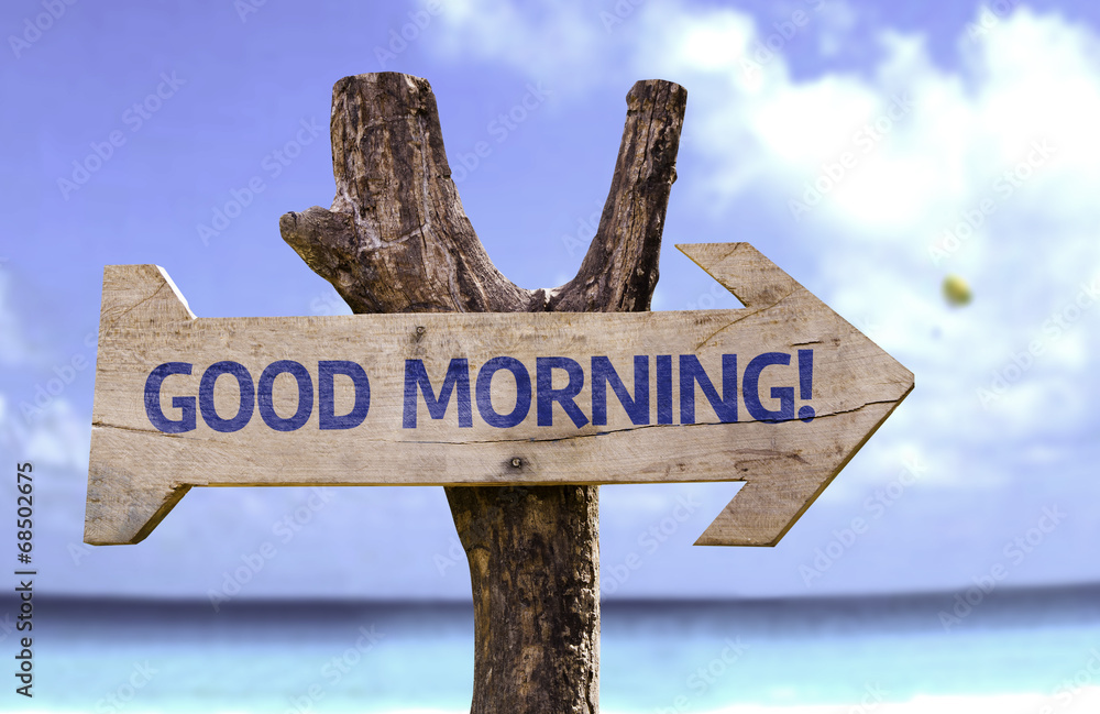 Good Morning! wooden sign with a beach on background
