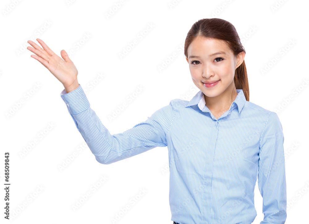 Asian businesswoman with hand presentation Asian businesswoman with hand presentation