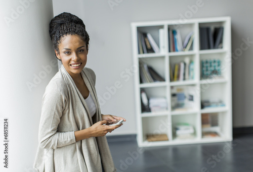 Pretty young woman in the o...
