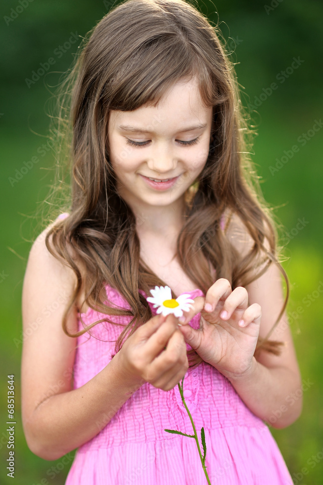 portrait of little girl outdoors in summer portrait of little girl outdoors in summer