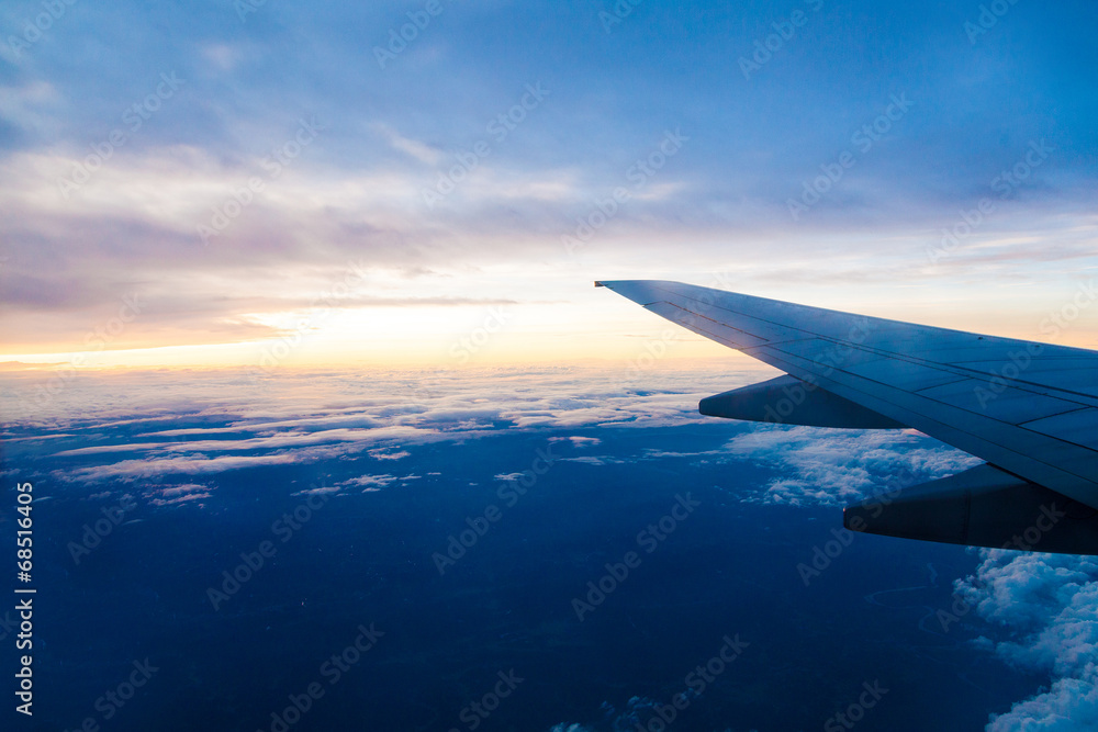 Fototapeta premium Classic image through aircraft window onto jet engine