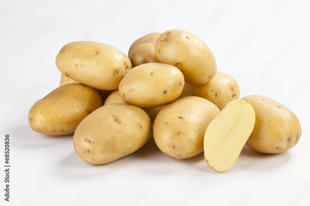 group of new nice potatoes on white background group of new nice potatoes on white background