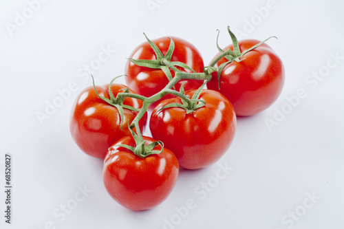 fresh cherry tomatoes isolated on whitte background © habrda