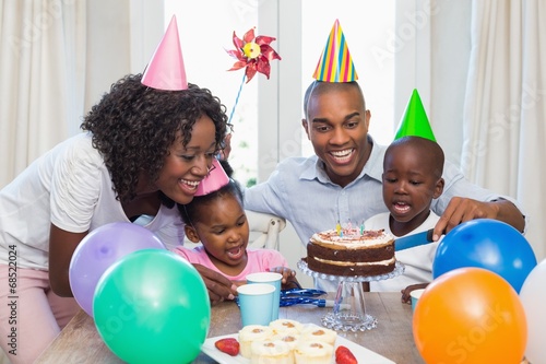 Photography Happy family celebrating a birthday together at table