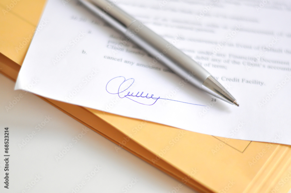 Signing a contract concept Signing a contract concept