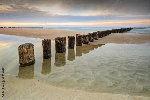 Obraz Wschód słońca na plaży
