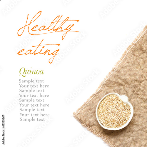 Raw Organic quinoa in a bowl on a white background photo