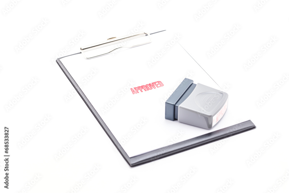 Stamp approved on clipboard. Stamp approved on clipboard.