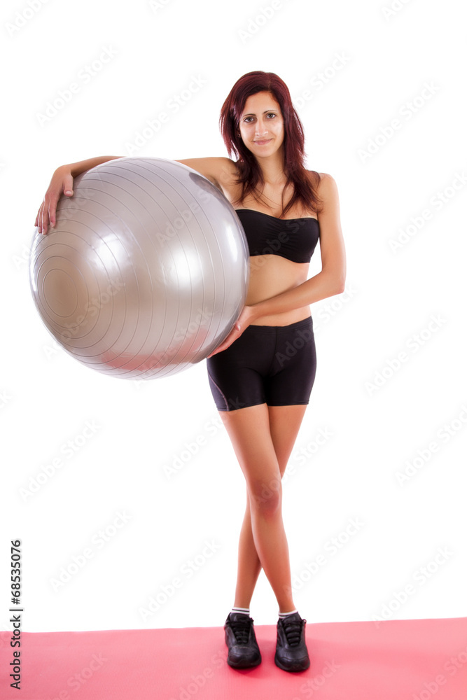 Beautiful healthy young girl with a fitness ball Beautiful healthy young girl with a fitness ball