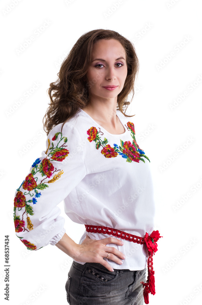 Girl in the Ukrainian national clothes isolated on white