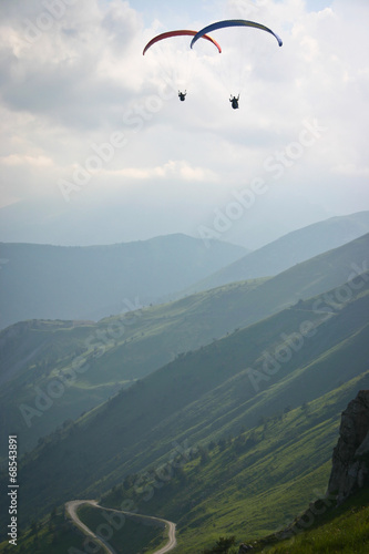 together, paragliding on Alps
