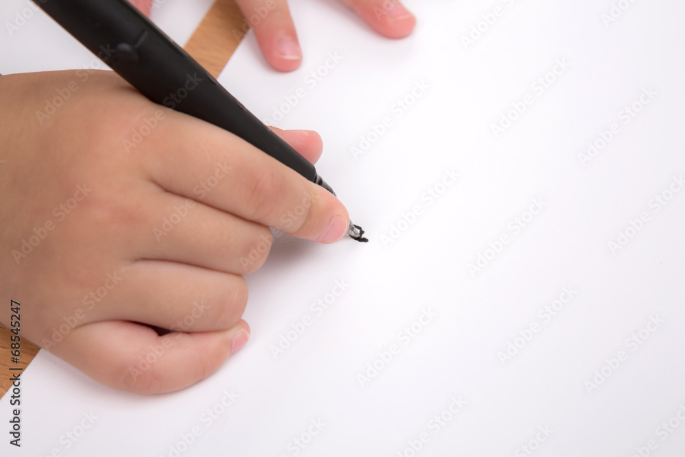 Preschool age child writing Preschool age child writing