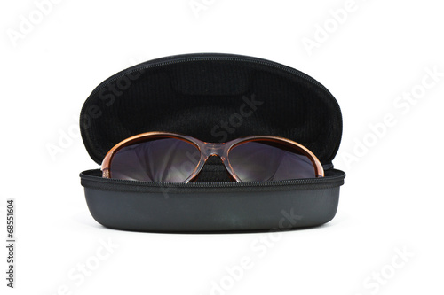 Fashion sunglasses and case on a white background