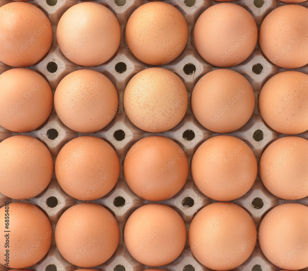top view of brown chicken eggs in box top view of brown chicken eggs in box