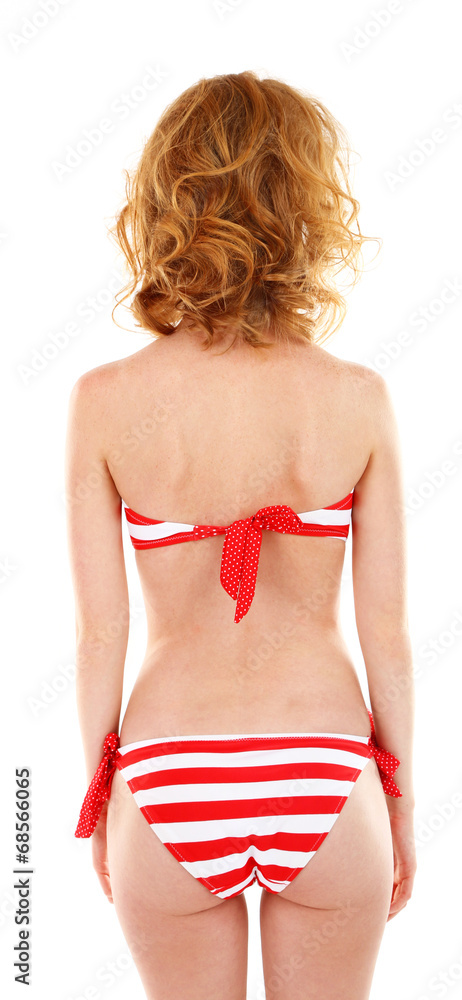 Young woman with slim body in swimsuit isolated on white Young woman with slim body in swimsuit isolated on white