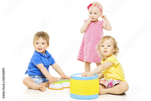 Children playing toys. Small Kids isolated white background