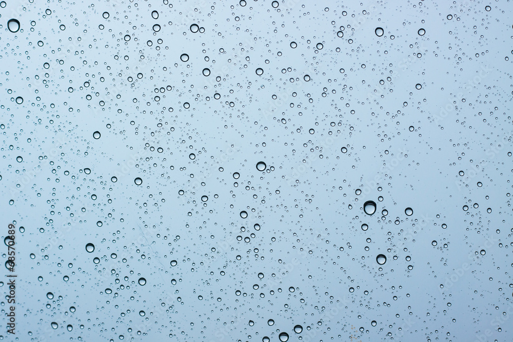 Water droplets on the glass while it was raining. Water droplets on the glass while it was raining.