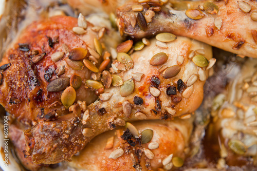 roasted chicken with garlic and honey seeds sunflower photo