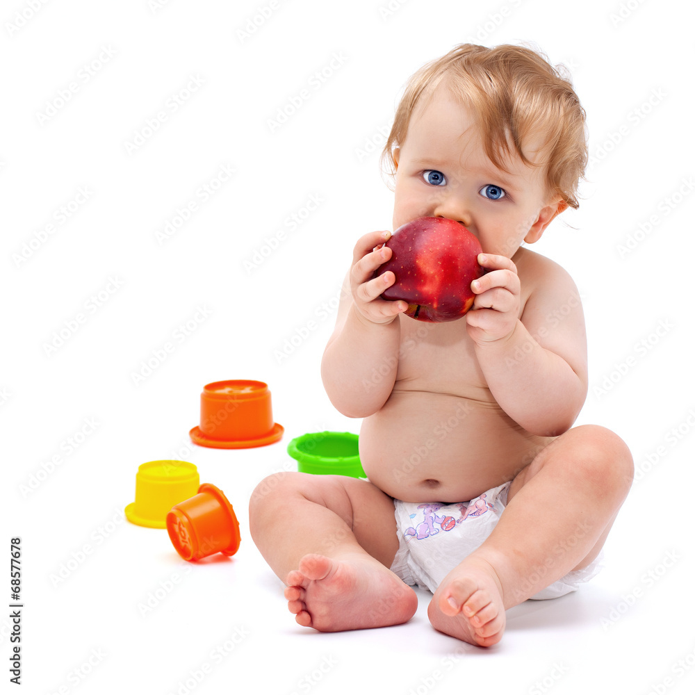 Cute infant boy with apple