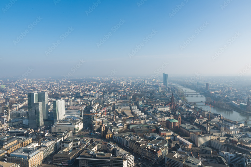 The cityscape of Frankfurt with Main River in winter time