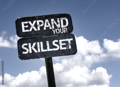 Expand Your Skillset sign with clouds and sky background photo