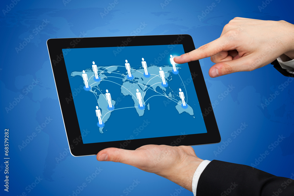 Businessman Touching World Map On Digital Tablet Businessman Touching World Map On Digital Tablet