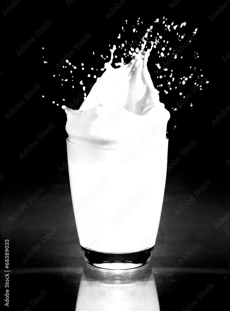 milk splashing from the glass milk splashing from the glass