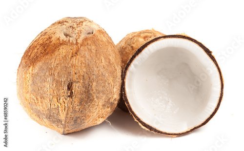 Coconut with straw isolated on white